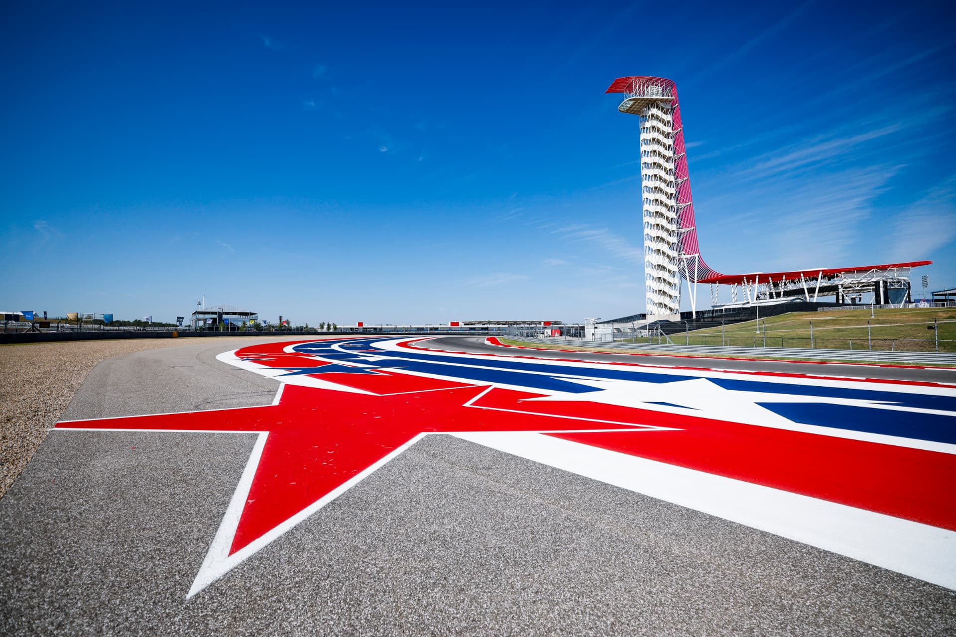 The COTA observation tower and painted stars on the apex curb in Austin, Texas.