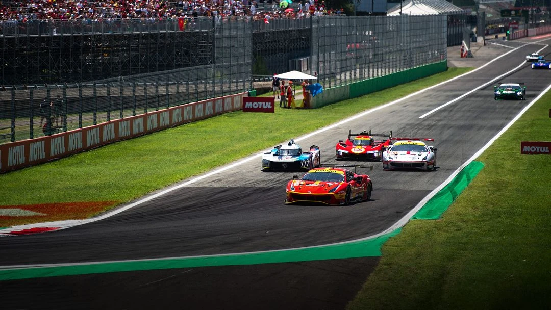 Ferrari Hypercar and GT cars on the pit straight at Monza during the WEC round.