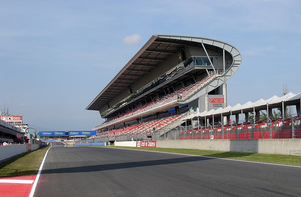The main grandstand at Circuit de Barcelona-Catalunya above the start-finish straight.